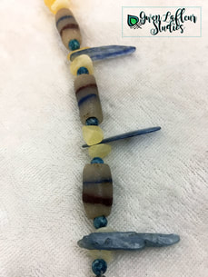 Closeup of beads surrounding pendant